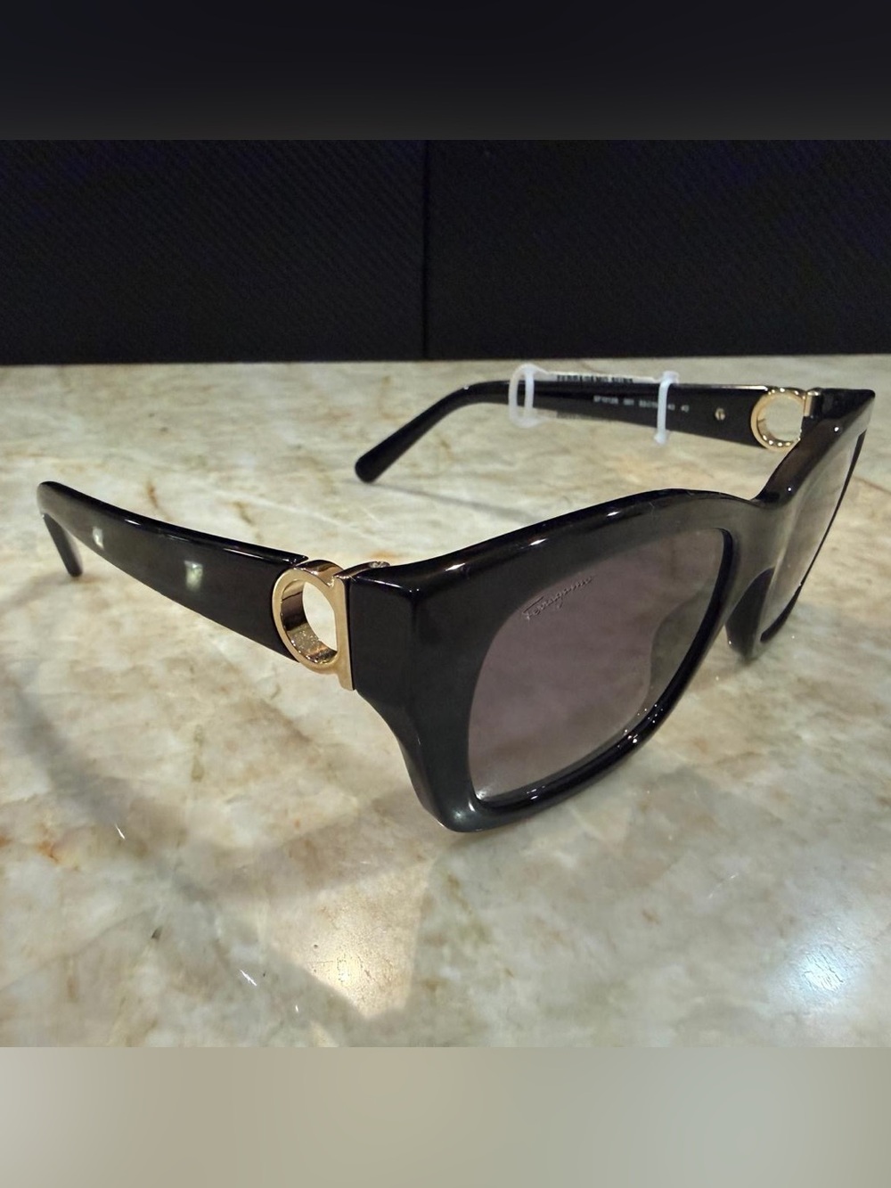 Salvatore Ferragamo SF
1012S 001 Black Sunglasses with Gradient Grey Lenses